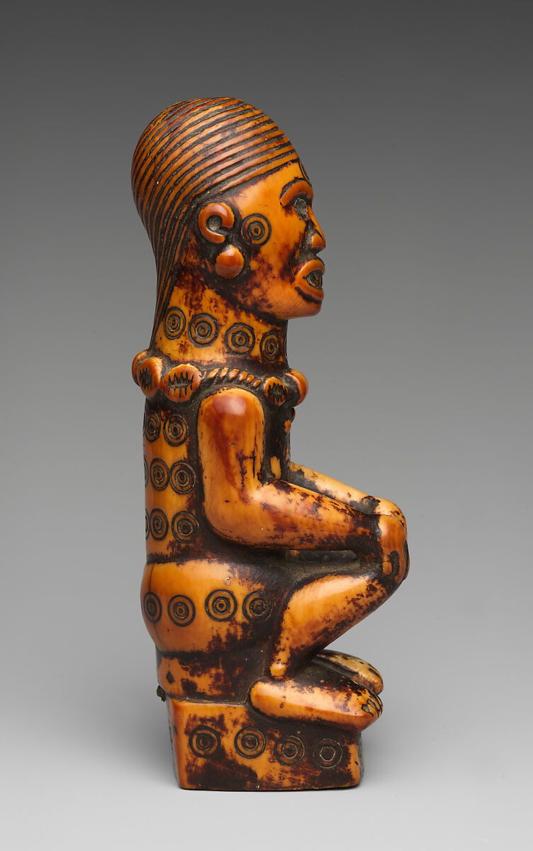 Staff finial with seated woman, "Master of the Frontal Concentric Circles" (active 19th century, Democratic Republic of the Congo or Republic of the Congo), Ivory, metal, wood, lead, Yombe-Kongo peoples