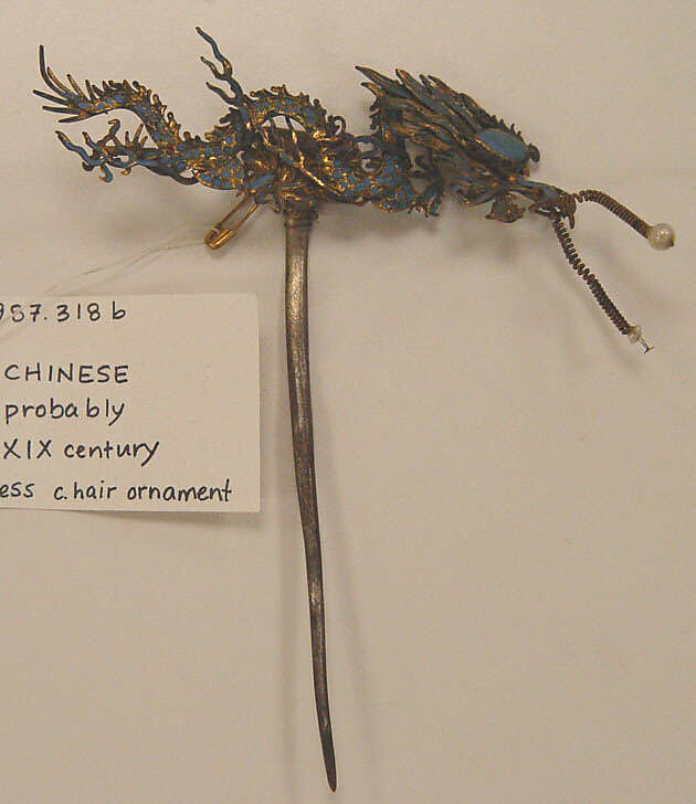 Hat, (a) silk, feathers, glass, metal, stone
(b, c) metal, feathers, paint, glass
(d–f) paper, silk, China