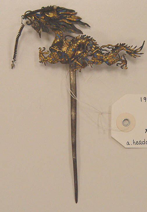 Hat, (a) silk, feathers, glass, metal, stone
(b, c) metal, feathers, paint, glass
(d–f) paper, silk, China