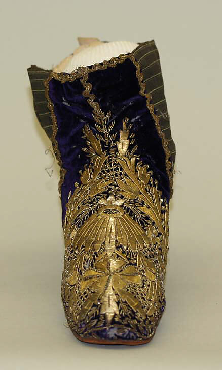 Pair of Ankle Shoes, Leather (sole), wood (heal), silk velvet, metal wrapped thread, twisted wire, spiral wire, and metallic sequins, wool (elastic band); embroidered