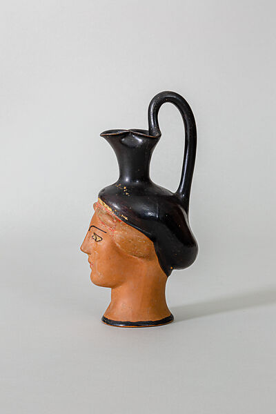 Oinochoe in the form of a woman's head, Class S: The Canessa Class of Head Vases, Terracotta, Greek