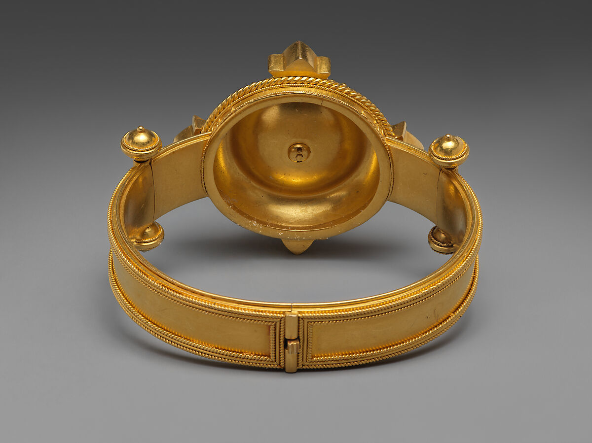 Hinged bracelet with Assyrian human-headed winged bull medallion, Gold , British