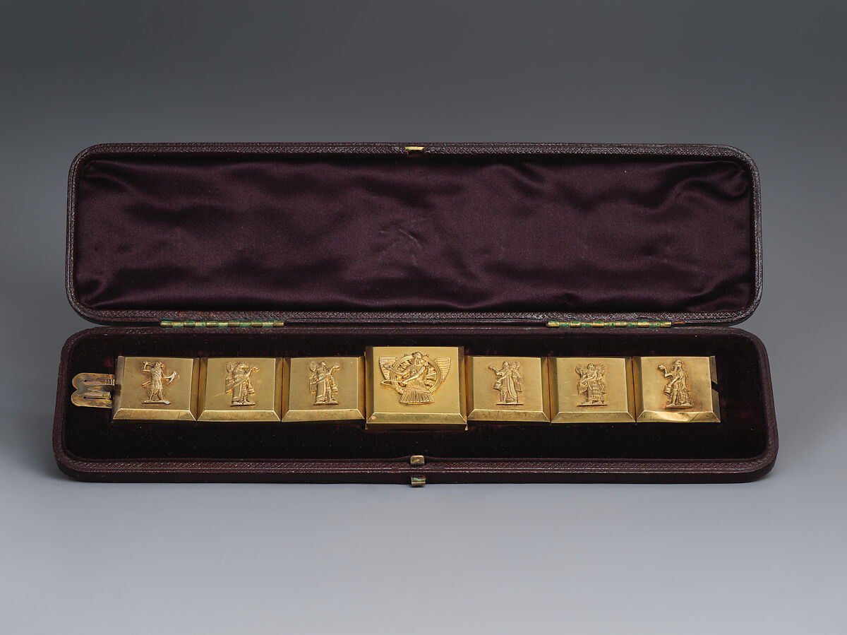 Hinged bracelet with Assyrian-inspired decoration, Gold, British