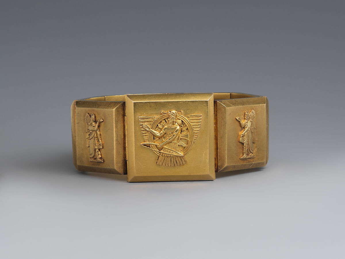 Hinged bracelet with Assyrian-inspired decoration, Gold, British