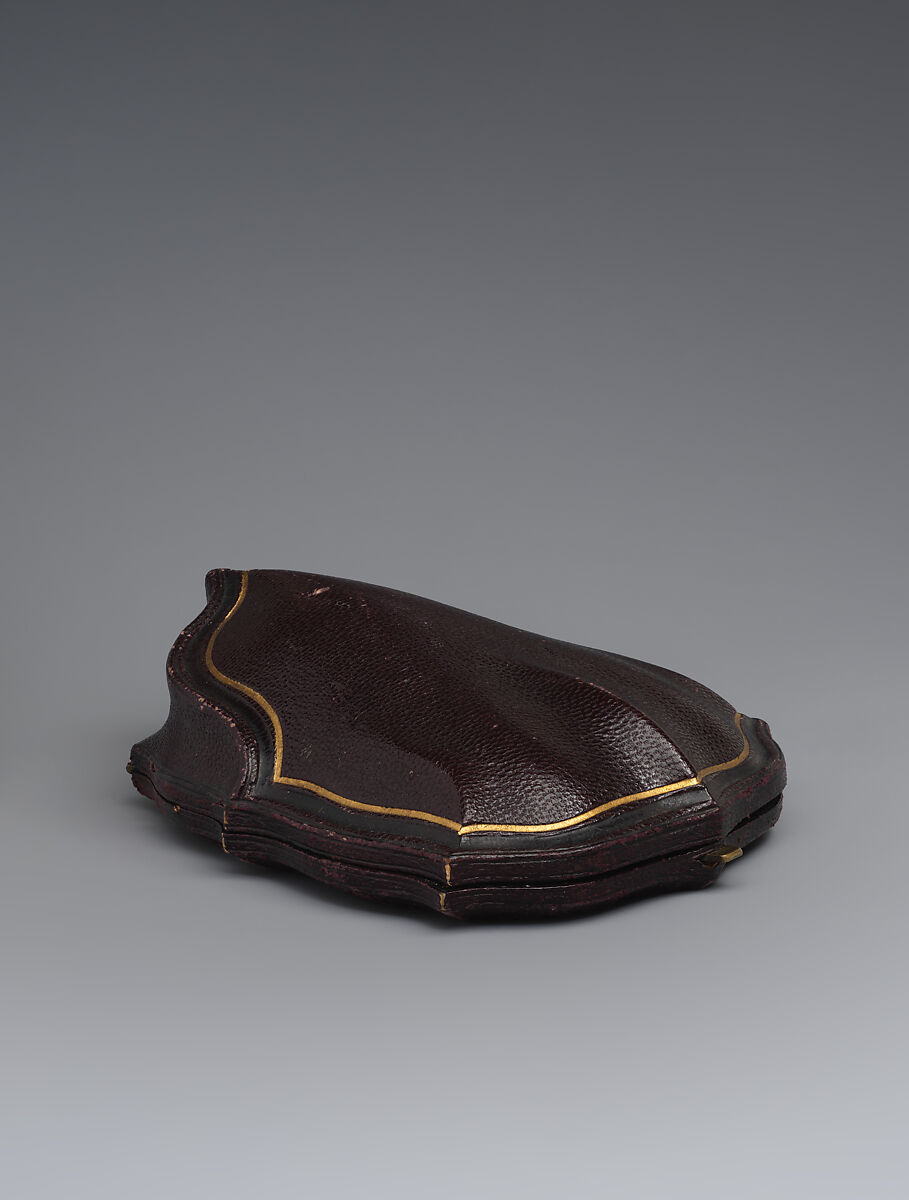 Brooch with Assyrian winged human-headed bull, Gold, glass, British