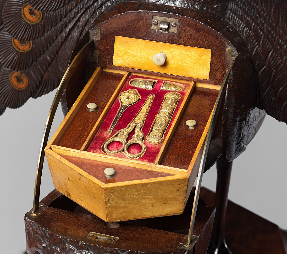 Work box in the form of a peacock, Mahogany, coniferous wood (pine?), oak; birch, boxwood, ebonized wood; inlay of sycamore, green stained holly, mahogany; bone, silver-gilt, blued steel, brass, velvet, printed paper, German, probably Berlin