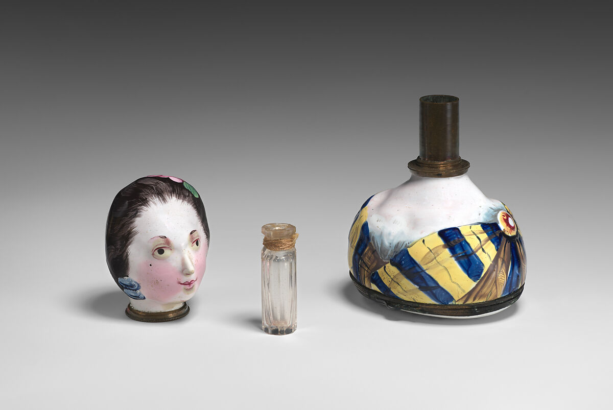 Bust of a woman bonbonnière and scent bottle, Enamel on copper, glass, British, possibly South Staffordshire, possibly Bilston
