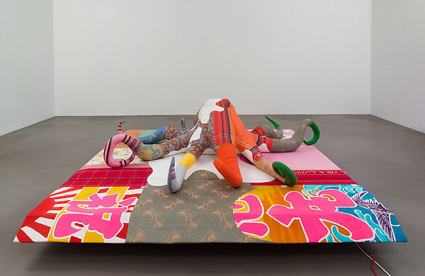 TOTAL PRODUCE (MORALITY), Cosima von Bonin (German, born Mombasa, Kenya 1962), Octopus: Various fabrics, polyfillBase: Various fabrics, foam materials, wood, fluorescent lights