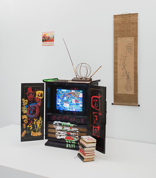 Chinese Memory, Nam June Paik (American (born Korea), Seoul 1932–2006 Miami, Florida), Single-channel video, color, silent, 21 min., 12 sec.; vintage television cabinet with permanent oil marker, glass, acrylic, record cover, scroll, antennae, and books