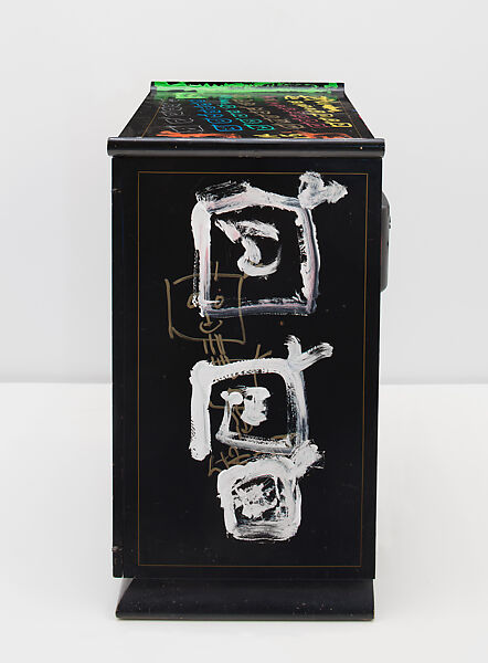 Chinese Memory, Nam June Paik (American (born Korea), Seoul 1932–2006 Miami, Florida), Single-channel video, color, silent, 21 min., 12 sec.; vintage television cabinet with permanent oil marker, glass, acrylic, record cover, scroll, antennae, and books