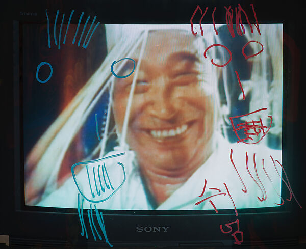 Chinese Memory, Nam June Paik (American (born Korea), Seoul 1932–2006 Miami, Florida), Single-channel video, color, silent, 21 min., 12 sec.; vintage television cabinet with permanent oil marker, glass, acrylic, record cover, scroll, antennae, and books