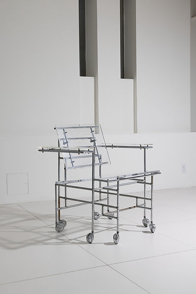 Rolling Dining Chair, Paul Rudolph  American, lucite, chromium plated tubular steel