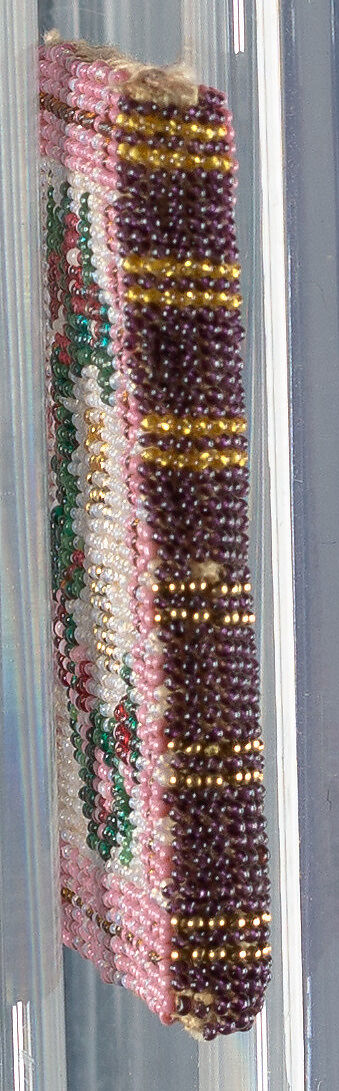 Needle case in book form, with the initials M.H.