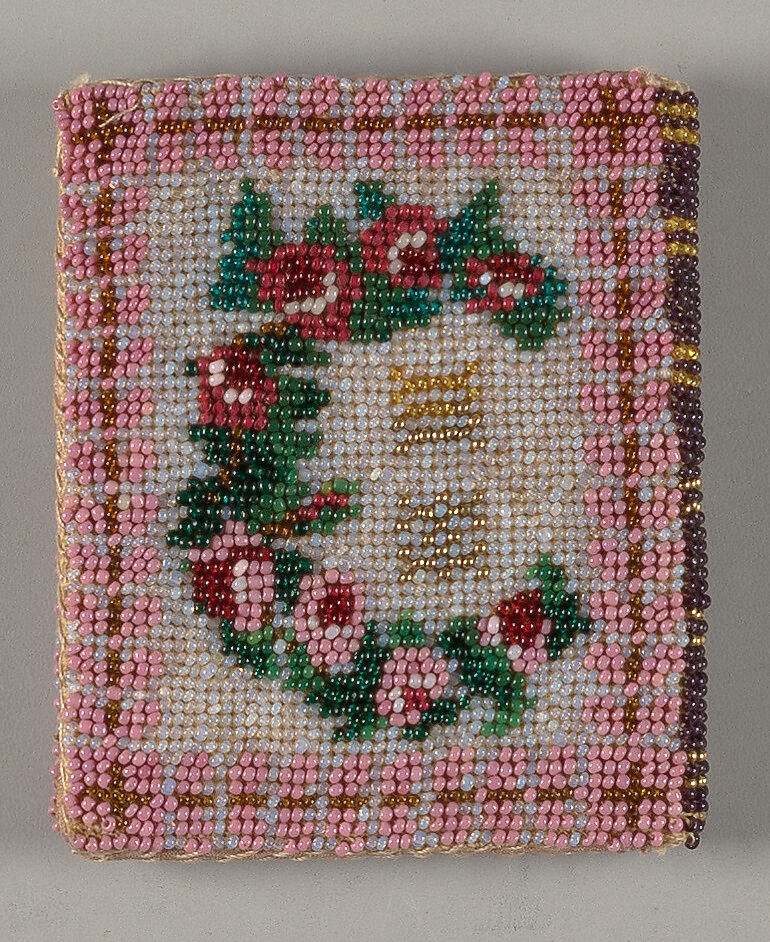 Needle case in book form, with the initials M.H.