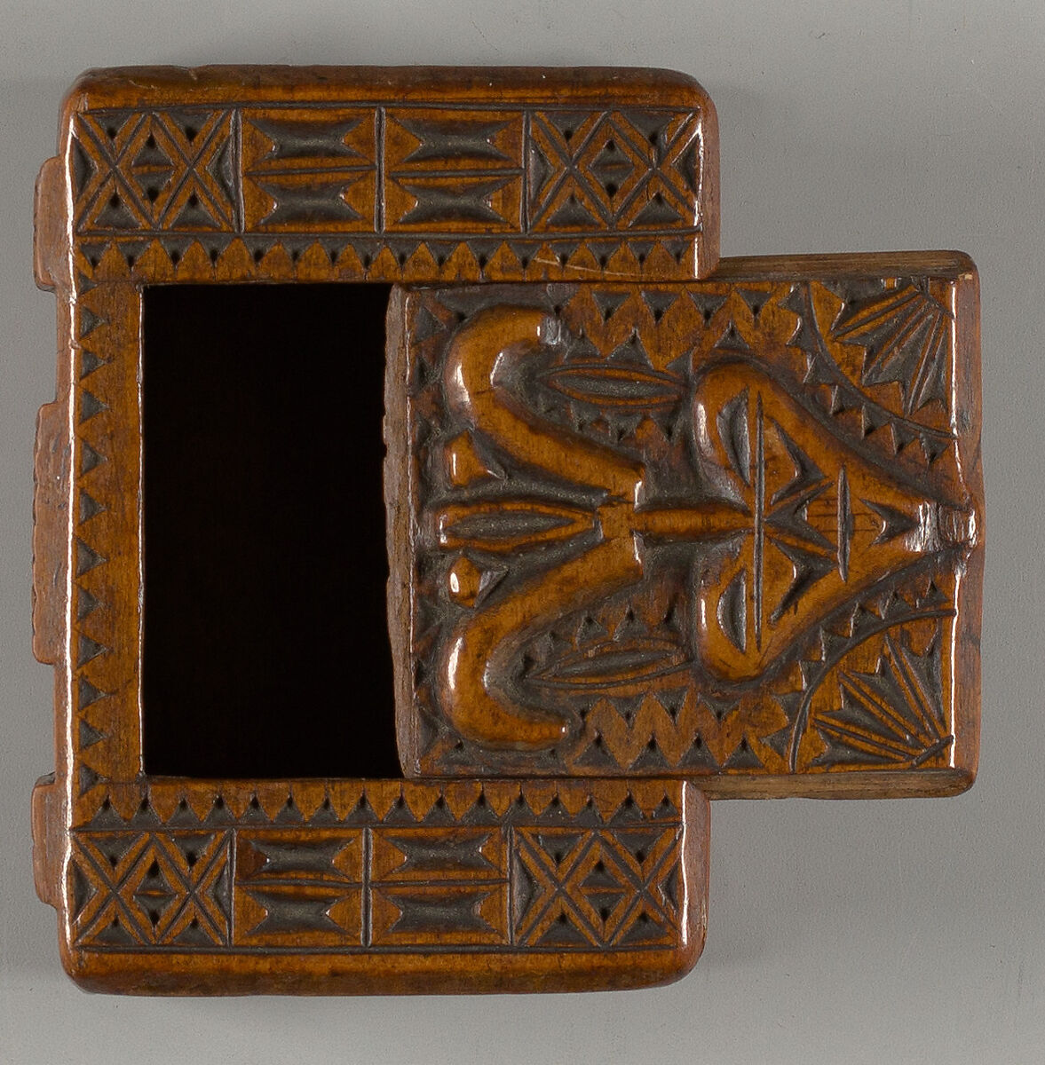 Box with tulip and hearts motif in book form