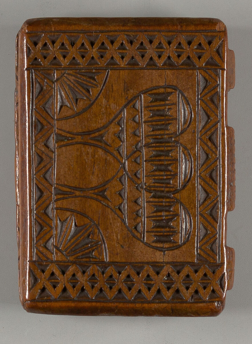 Box with tulip and hearts motif in book form