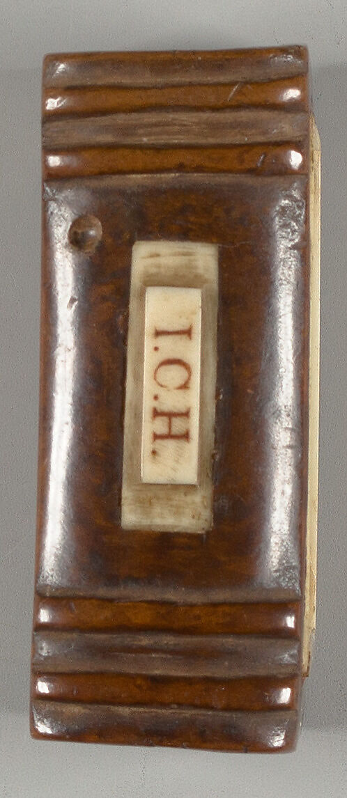 Memento in book form, with photograph of a child and initials I.C.H