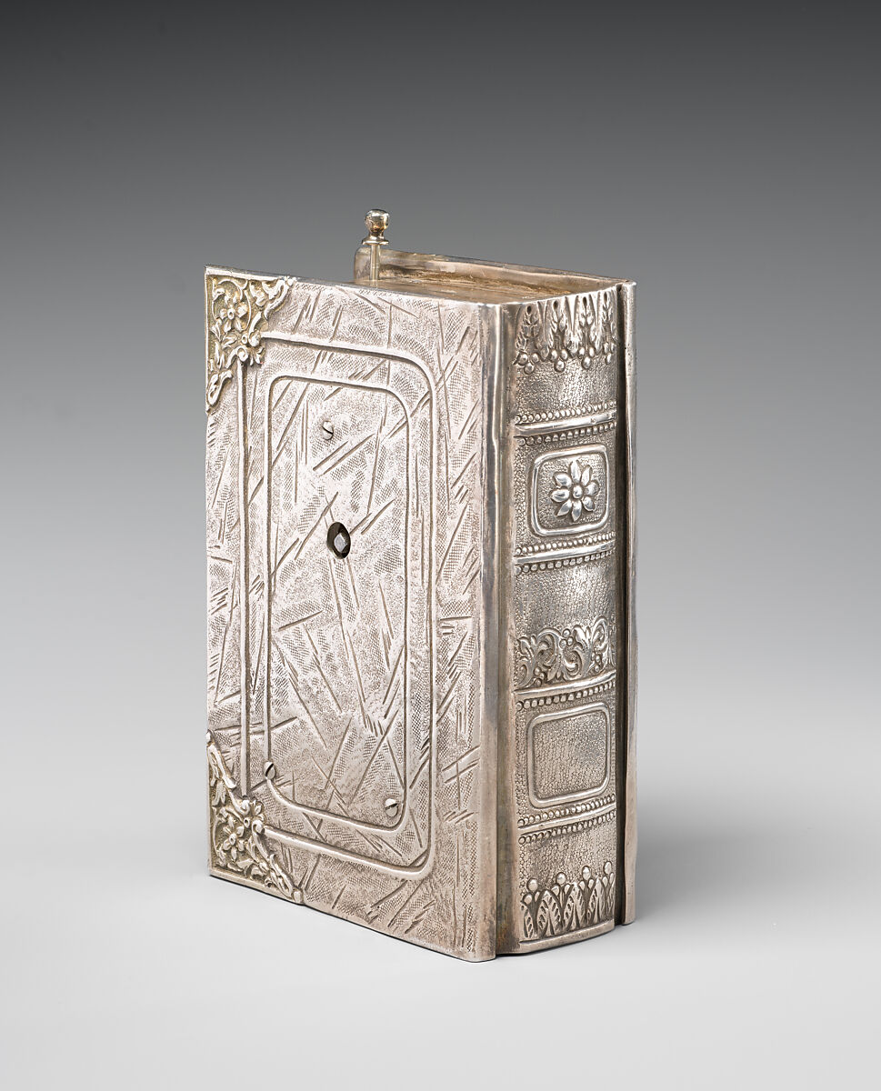 Mechanical singing bird box in book form