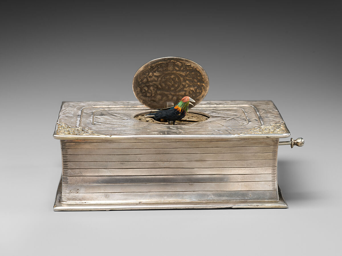 Mechanical singing bird box in book form