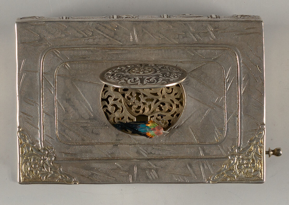 Mechanical singing bird box in book form