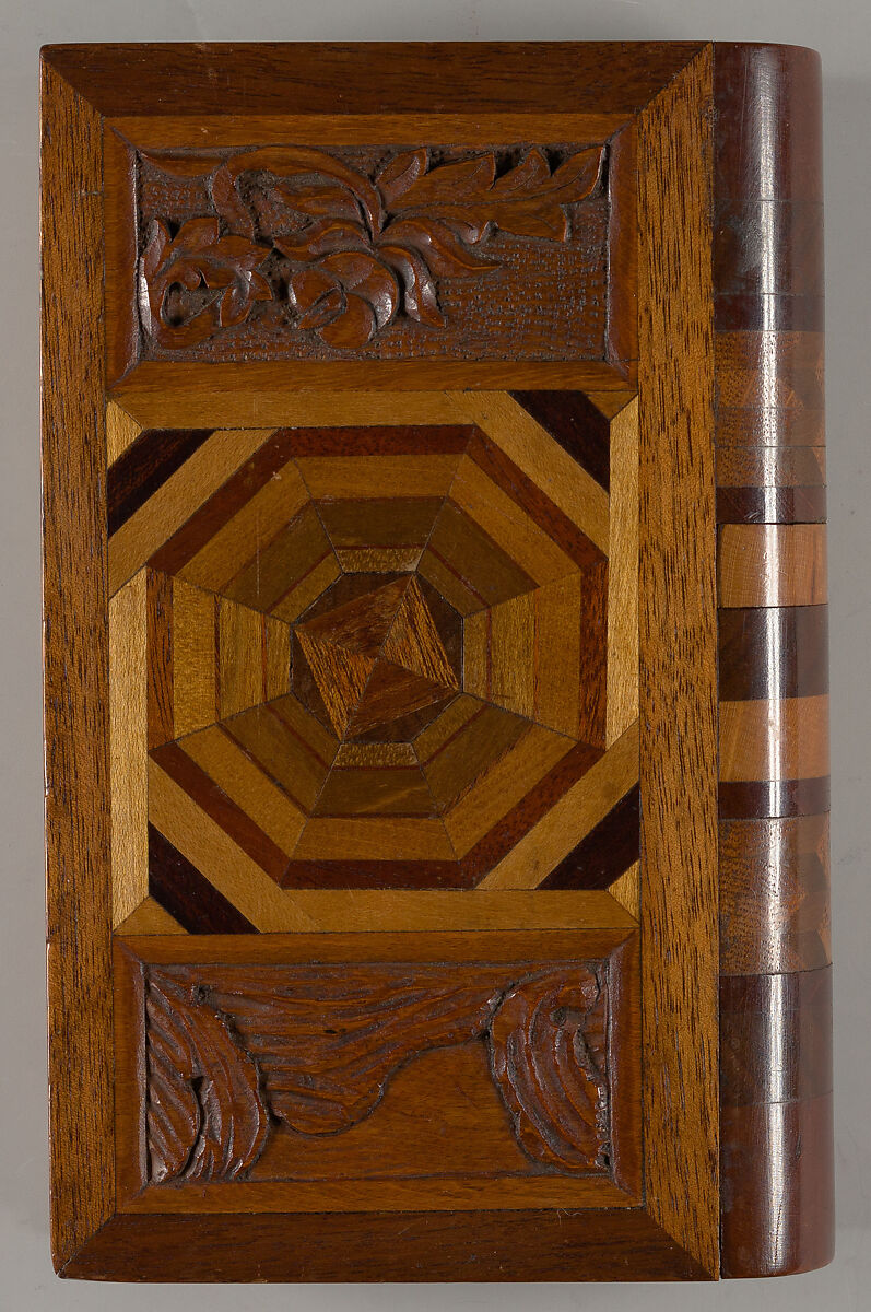 Box in book form, inlaid and carved specimen wood box with hidden locking device in spine, Vincenzo Chiappinelli