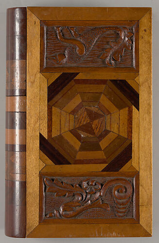 Box in book form, inlaid and carved specimen wood box with hidden locking device in spine