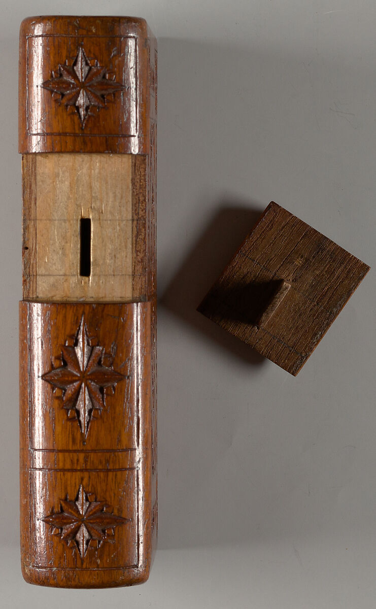 Carved wood puzzle box in book form