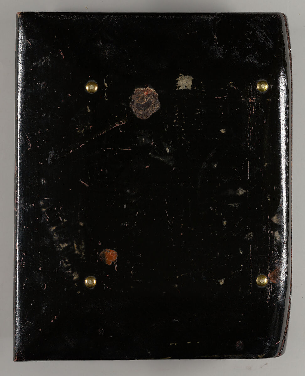 Desk or dresser box in book form, painted with the initial "T"