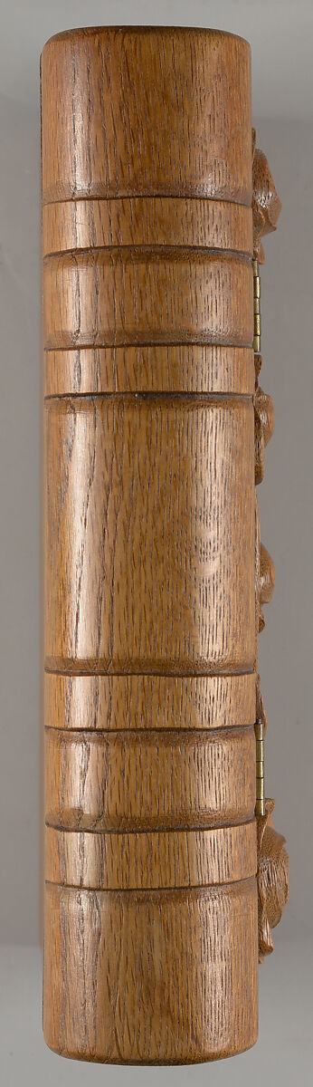 Box in book form, carved with roses