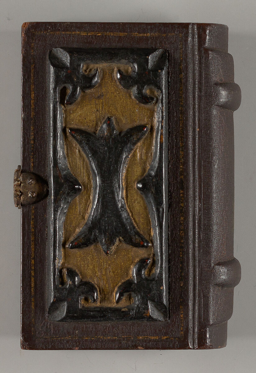 Relief-carved solid book