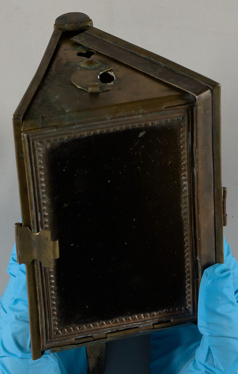 Folding portable lantern in book form