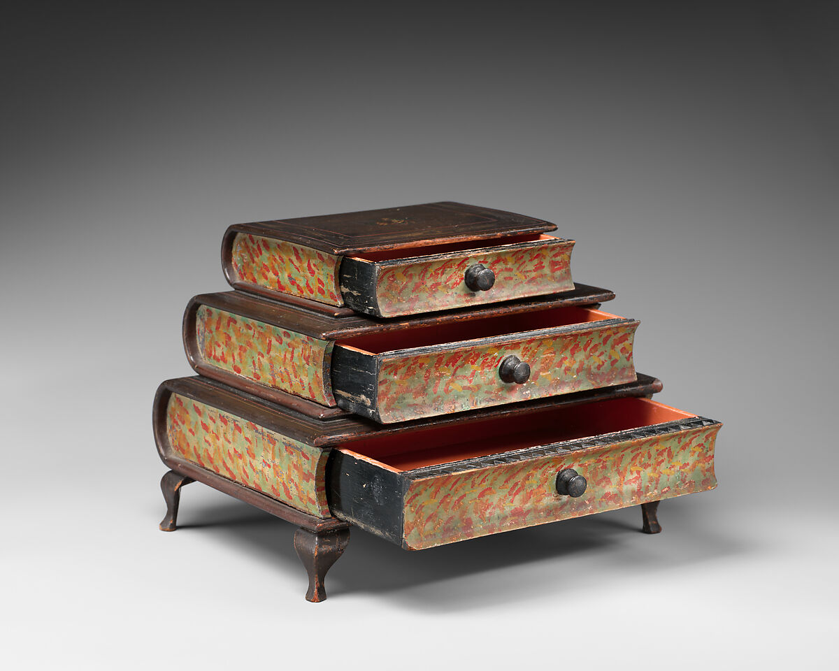 Graduated, three-tiered, footed box in book form