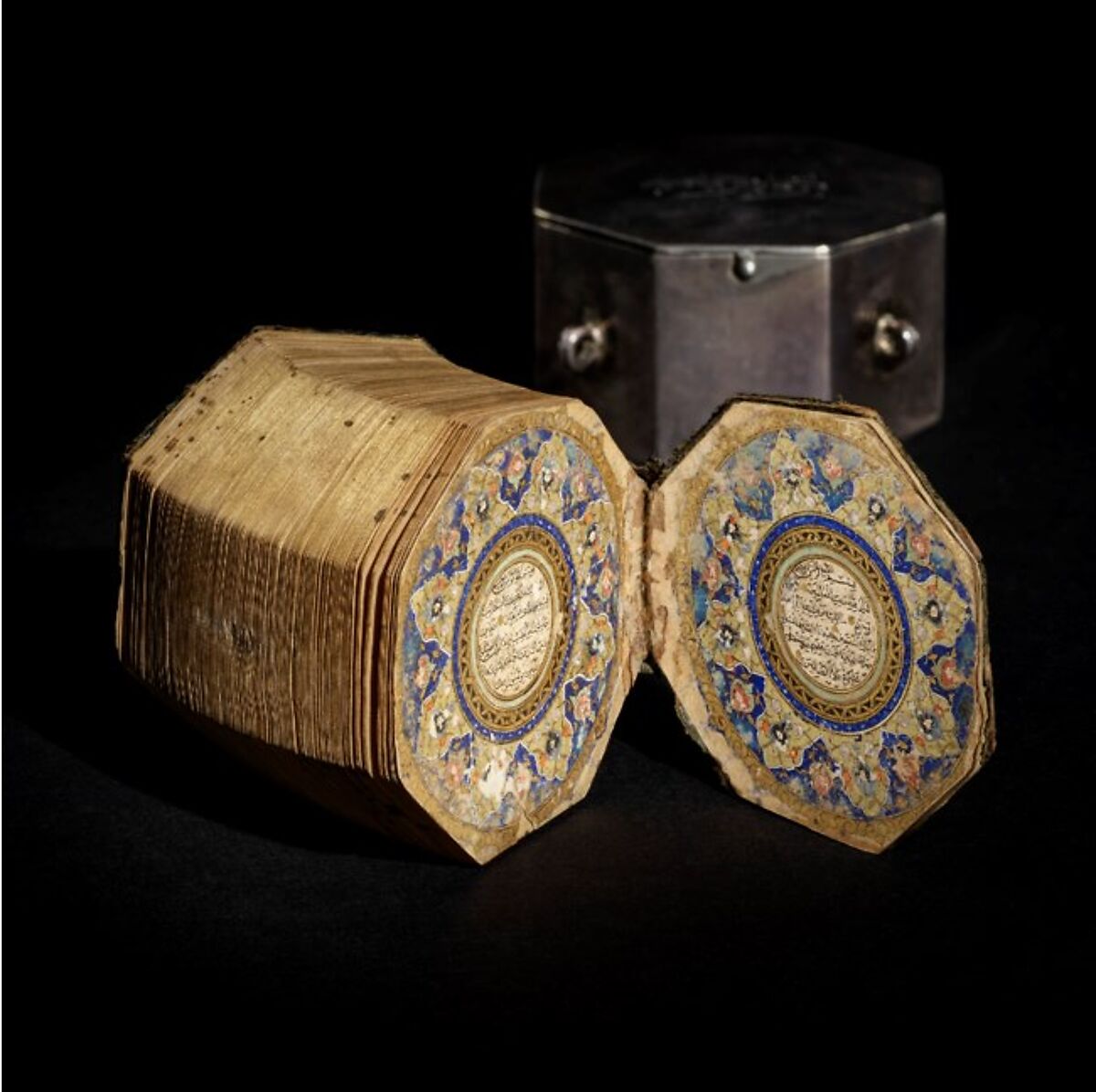Miniature Qur'an and Qur'an Case, Muhammad Al-Qari (died 1605, Herat, present-day Afghanistan), Qur'an: Ink, opaque watercolor, and gold on paper
Qur'an case: Silver