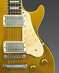 Les Paul Model Electric Guitar and Amplifier, Gibson (American, founded Kalamazoo, Michigan 1902), Neck/Head: Honduran Mahogany; Headstock Veneer: Painted holly; Headstock Decoration: Mother of Pearl; Truss Rod Cover: Plastic; Tuning Machines: Metal; Machine Head Buttons: Plastic; Nut: Bone?; Fingerboard: Brazilian Rosewood; Fret markers: Mother of Pearl; Frets: Nickel silver; Strings: Metal; FB Binding: Plastic; Pick up covers: Plastic; Vol/Tone knobs: Plastic; Soundboard/Top: Honduran Mahogany; Solid Body: Honduran Mahogany 
Binding: Plastic; 
Pickguard: Plastic; Bridge: Metal; Neck side strap button: Metal 
End strap button: Metal; Tailpiece: Metal, American