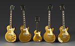 Les Paul Model Electric Guitar and Amplifier, Gibson (American, founded Kalamazoo, Michigan 1902), Neck/Head: Honduran Mahogany; Headstock Veneer: Painted holly; Headstock Decoration: Mother of Pearl; Truss Rod Cover: Plastic; Tuning Machines: Metal; Machine Head Buttons: Plastic; Nut: Bone?; Fingerboard: Brazilian Rosewood; Fret markers: Mother of Pearl; Frets: Nickel silver; Strings: Metal; FB Binding: Plastic; Pick up covers: Plastic; Vol/Tone knobs: Plastic; Soundboard/Top: Honduran Mahogany; Solid Body: Honduran Mahogany 
Binding: Plastic; 
Pickguard: Plastic; Bridge: Metal; Neck side strap button: Metal 
End strap button: Metal; Tailpiece: Metal, American