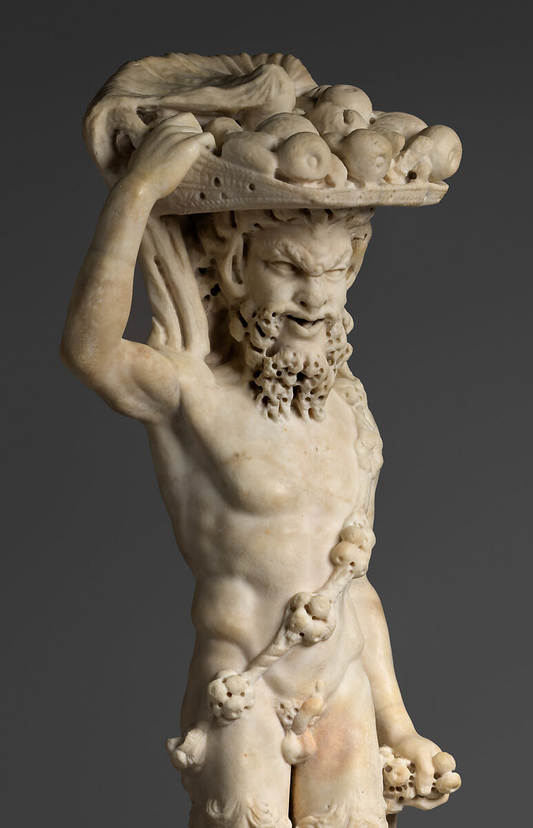 Marble statue of Pan/ Pan or Satyr with winnowing basket filled with offerings and cultic objects, Marble