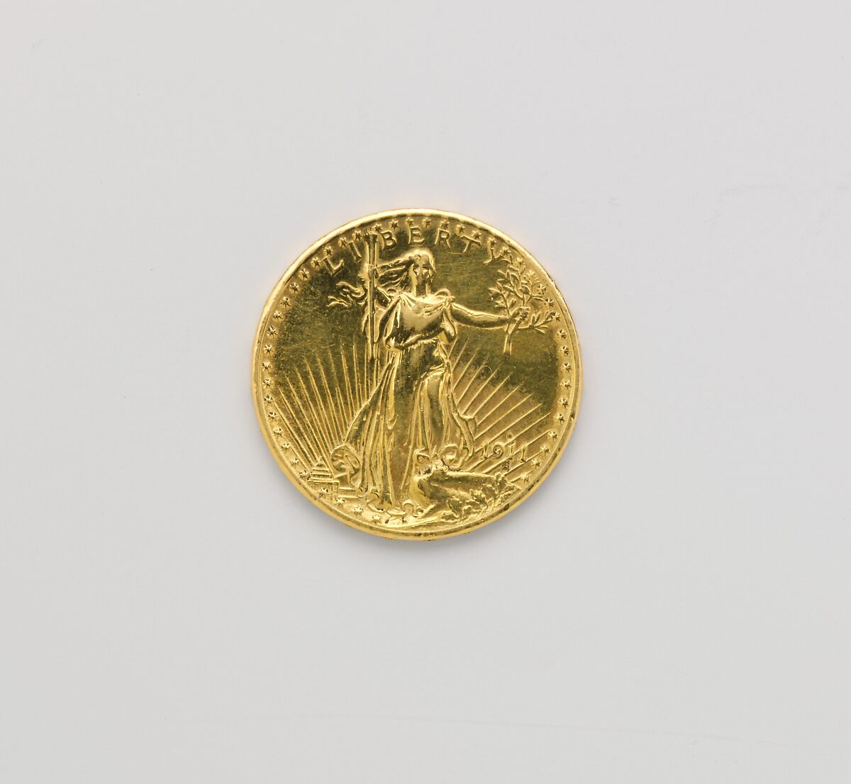 In this photo illustration, a reverse of the United States 1 dollar coin  with Statue of