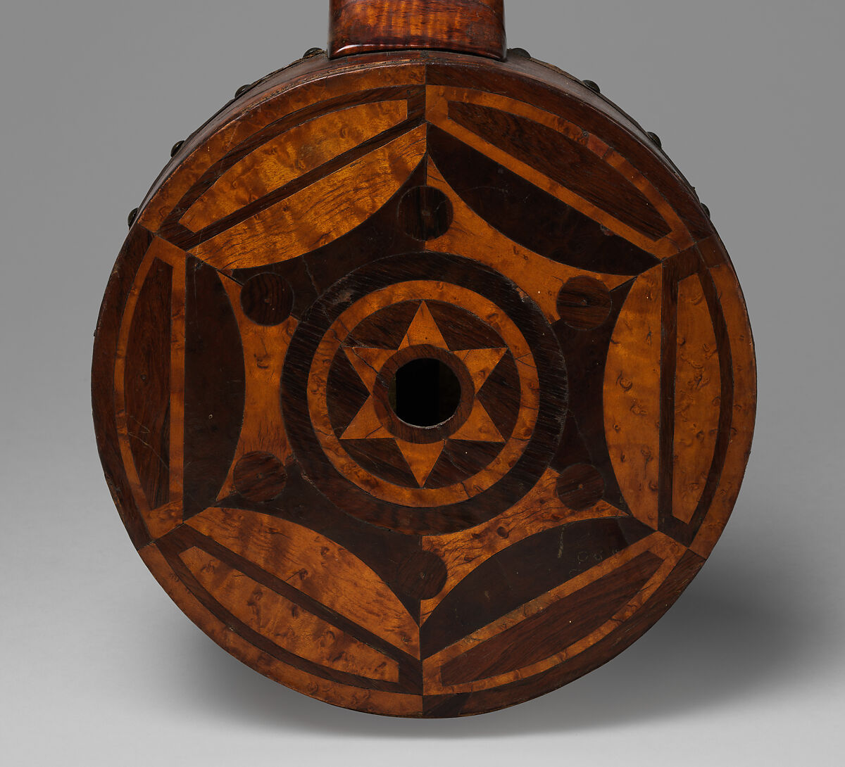 Fretless tackhead banjo, Maple and various other woods, metal tacks, calfgut strings , American