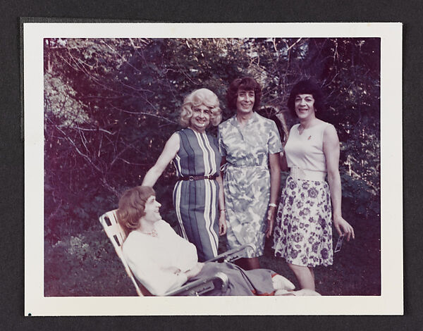 [Daphne sitting on a lawn chair with Ann, Susanna and a friend outside, Casa Susanna, Hunter, NY]
, Andrea Susan  American, Chromogenic print