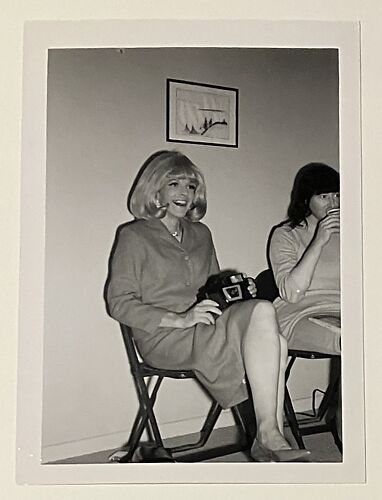 [Crystal sitting with camera]