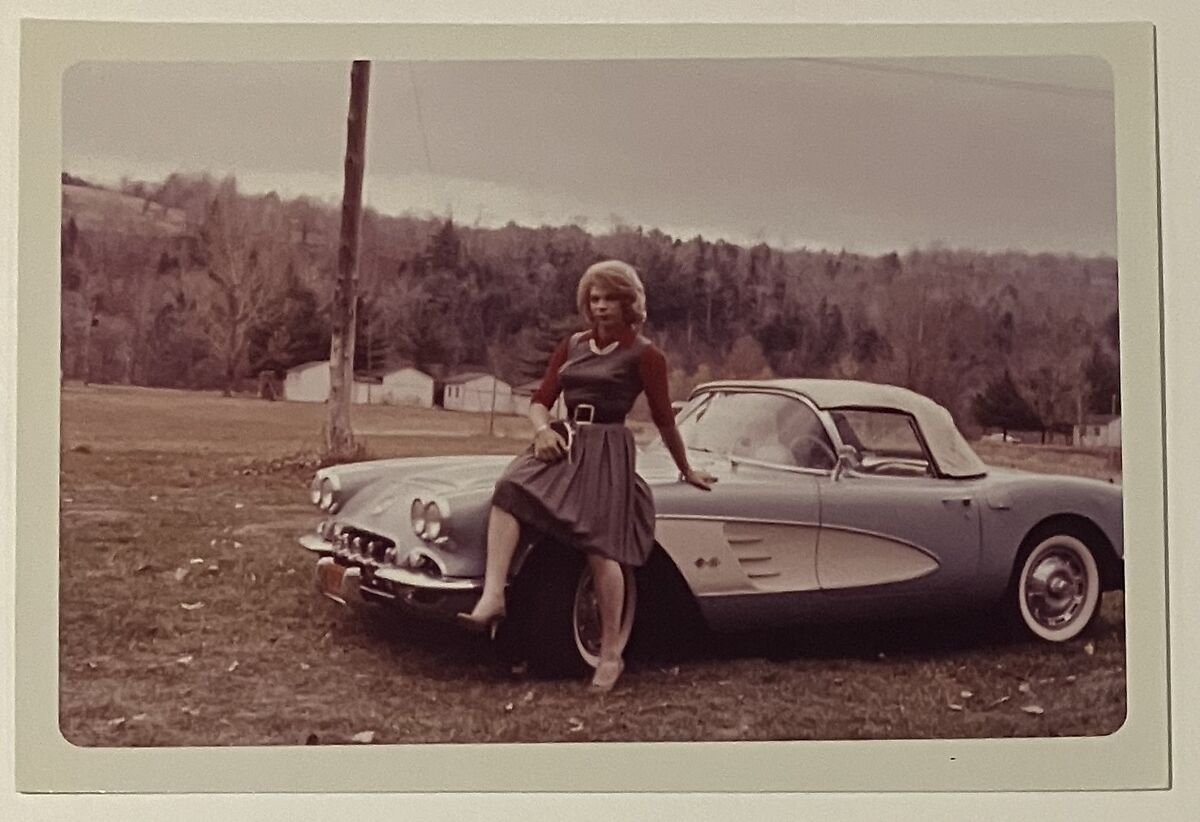 [Andrea Susan sitting on car at Chevalier d'Eon], Unknown, Chromogenic print