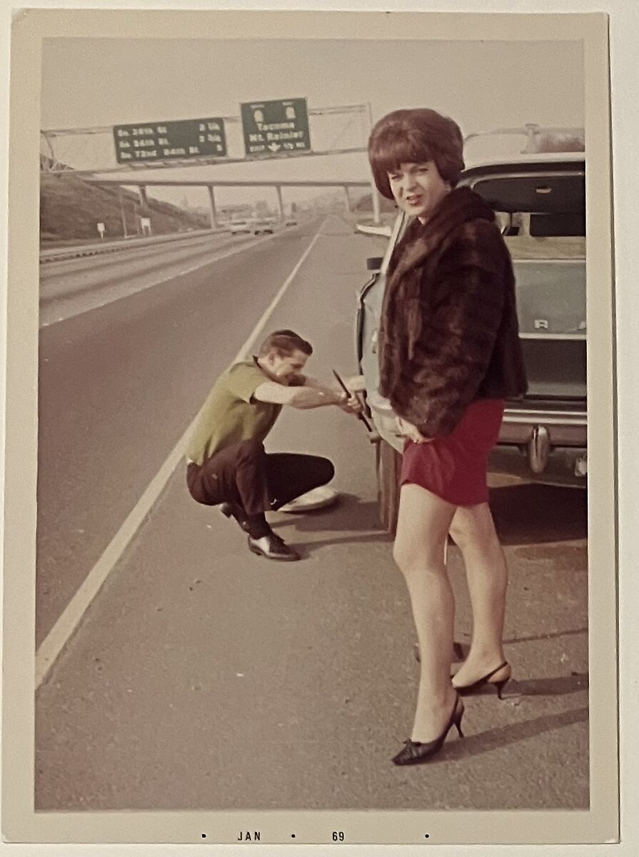 [Kate on highway with man fixing tire], Unknown, Chromogenic print
