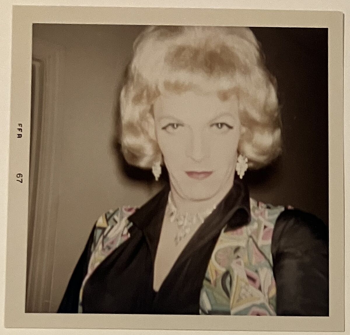 [Crystal in blonde wig and earrings], Unknown, Chromogenic print