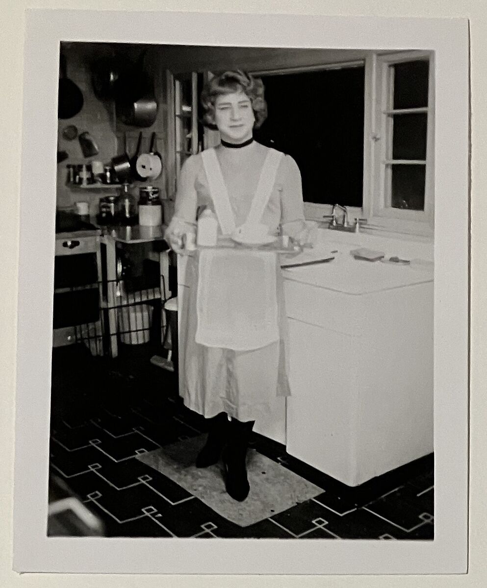 [Gail standing in Chevalier kitchen], Unknown, Gelatin silver print