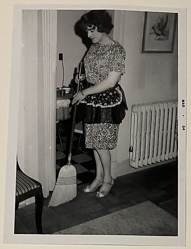 [Crossdresser sweeping]