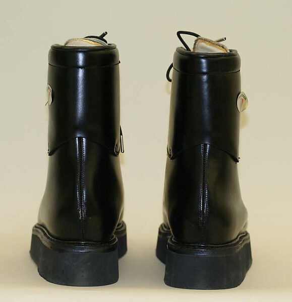 Athletic ensemble, Parachutes Incorporated, cotton
b) plastic
d—g) leather, American