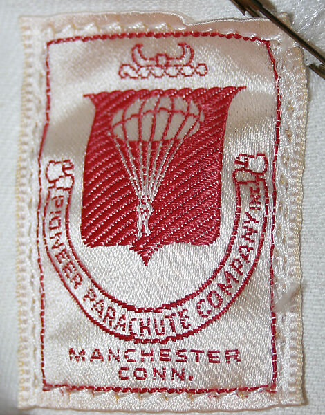 Athletic ensemble, Parachutes Incorporated, cotton
b) plastic
d—g) leather, American