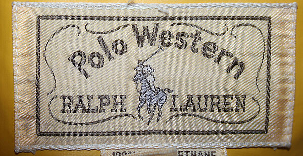 Raincoat, Ralph Lauren (American, born 1939), plastic (cellulose nitrate, styrene-butadiene copolymer), cotton, metal, American