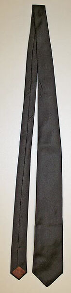 Suit, (d) House of Dior (French, founded 1946), (a,b) cashmere
(c) cotton
(d) silk
(e,f) leather
(g,h) rayon (?), Italian