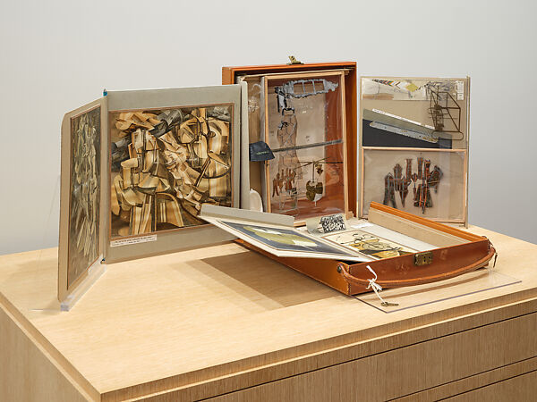 Boîte-en-valise, Marcel Duchamp (American (born France), Blanville 1887–1968 Neuilly-sur-Seine), Leather valise containing a box with 69 reproductions and an original item, La Fourchette du Cavalier (card, cut out, with chicken wire inserted)